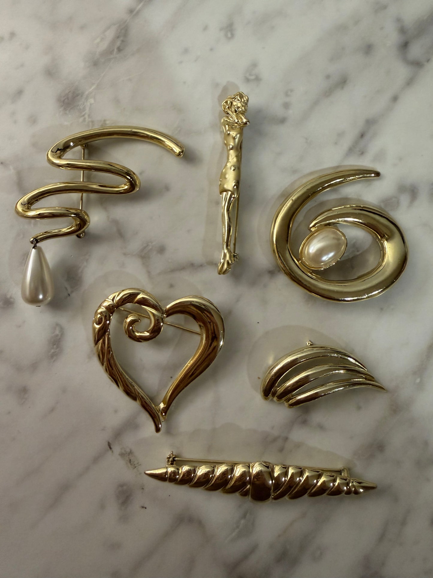Gold brooch pack