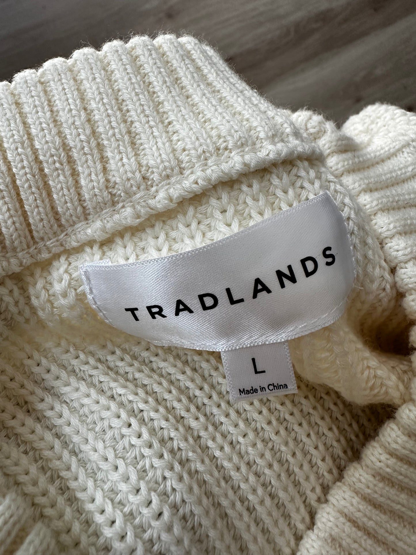 Translates cream and black striped sweater. Organic cotton. Size large