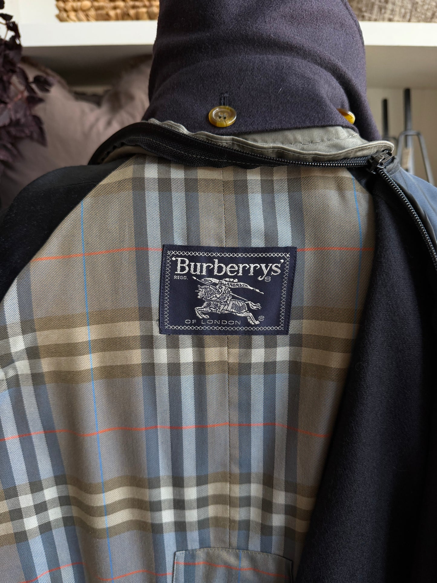 Vintage Burberry green trench with navy wool zip out lining and button off collar. Fits S-L
